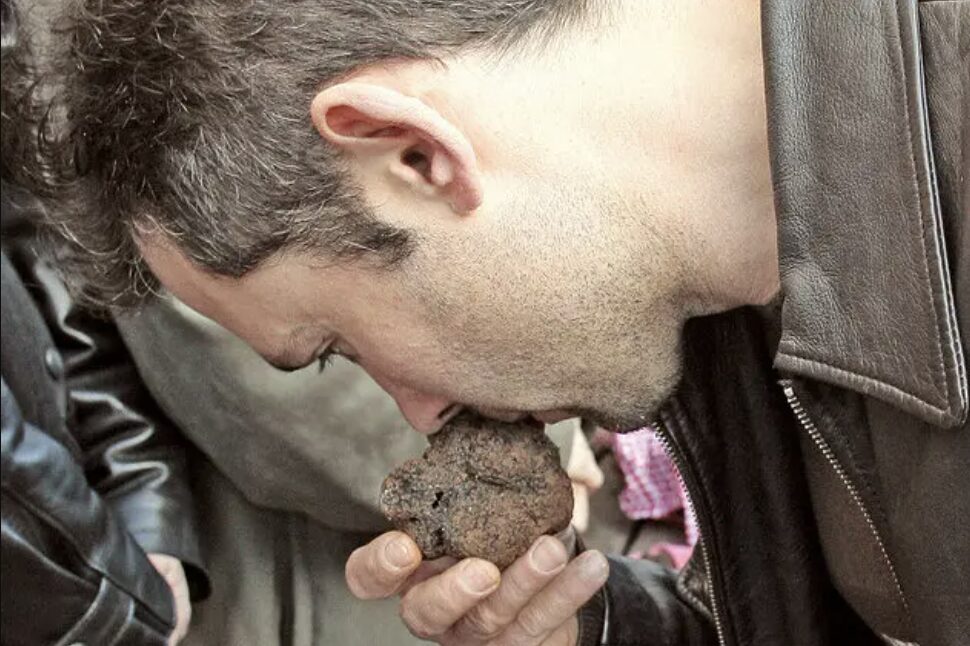 Man smelling truffles, mmm